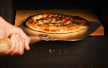 Hoe werkt een houtgestookte pizza oven?